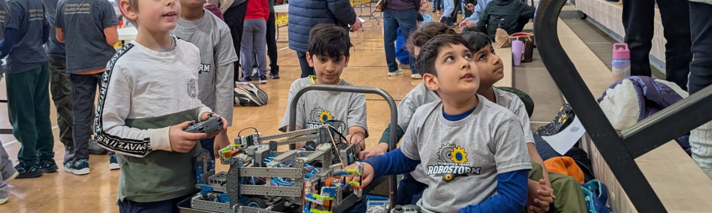 Kids building Lego VEX IQ robots LeapCoderz